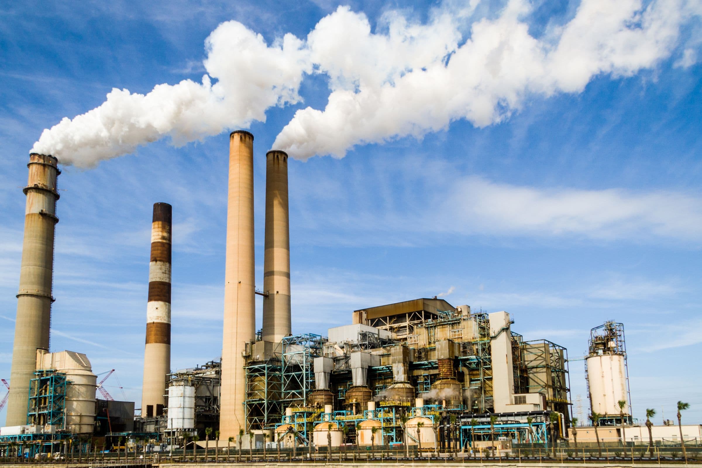 Industrial energy facility under a clear sky